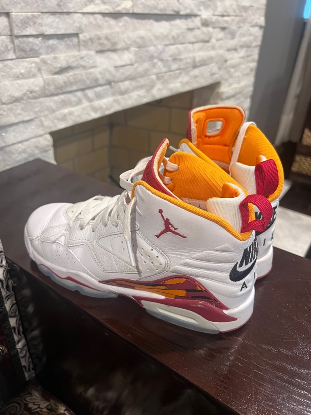Jordan Kids White High-Top Sneakers with Red & Orange Accents